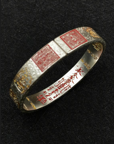 Handcrafted silver talisman bracelet